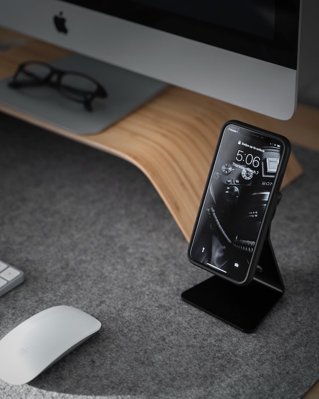 Desktop computer and phone on a desk